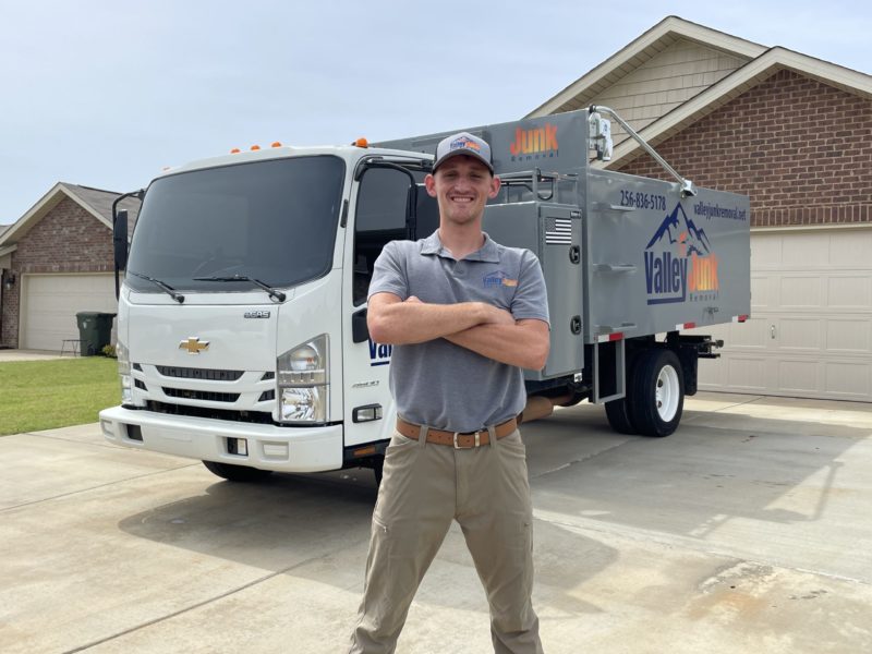Valley Junk Removal Owner Standing In Front of Junk Removal Truck before services in Alabama