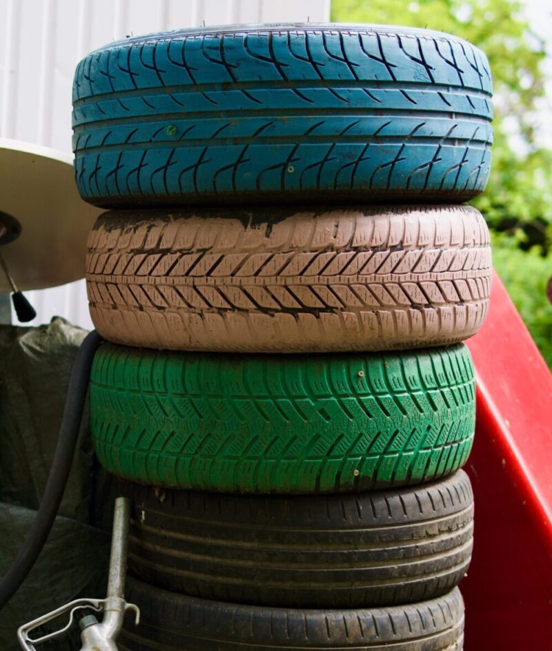 Pile of tires at a home in Huntsville in need of tire hauling services